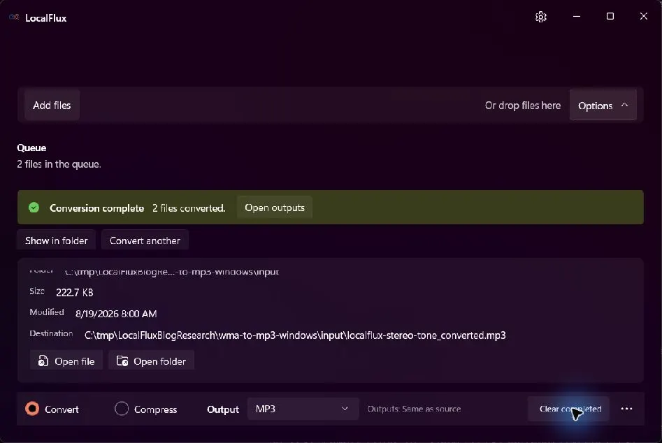 Two completed WMA-to-MP3 conversions in LocalFlux.