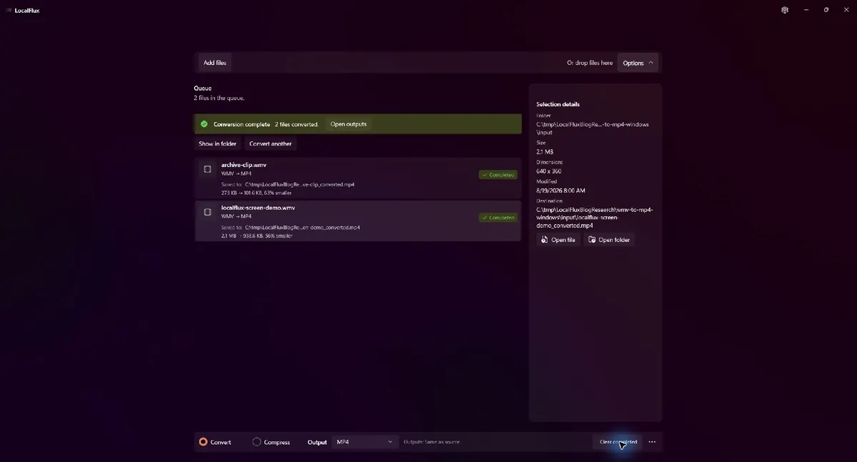 LocalFlux showing two completed WMV-to-MP4 conversions in a neutral C tmp folder.
